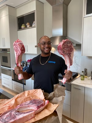 Chef Mike holding meat